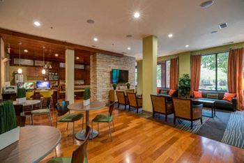 Social lounge with tvs and comfortable seating and conversation areas